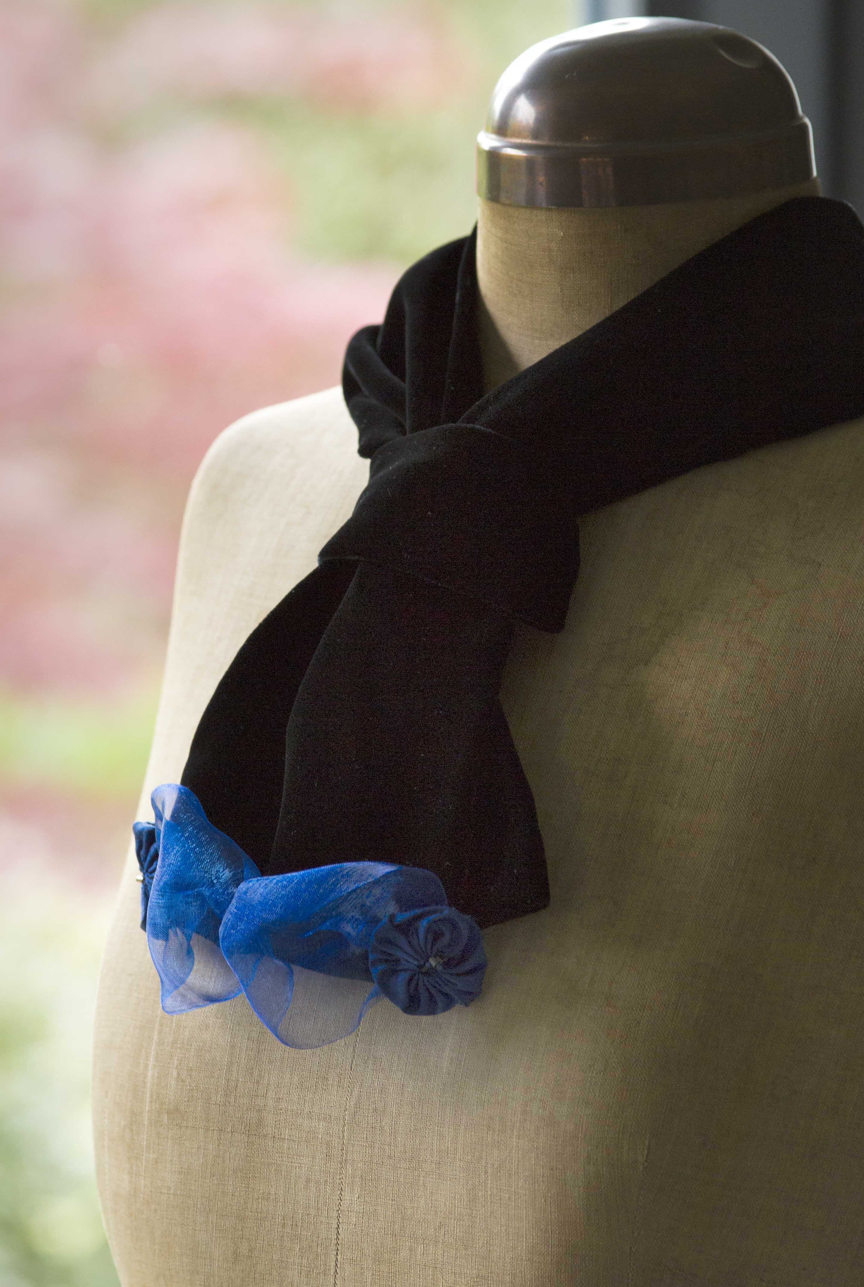 Black velvet scarf with blue ribbon trim