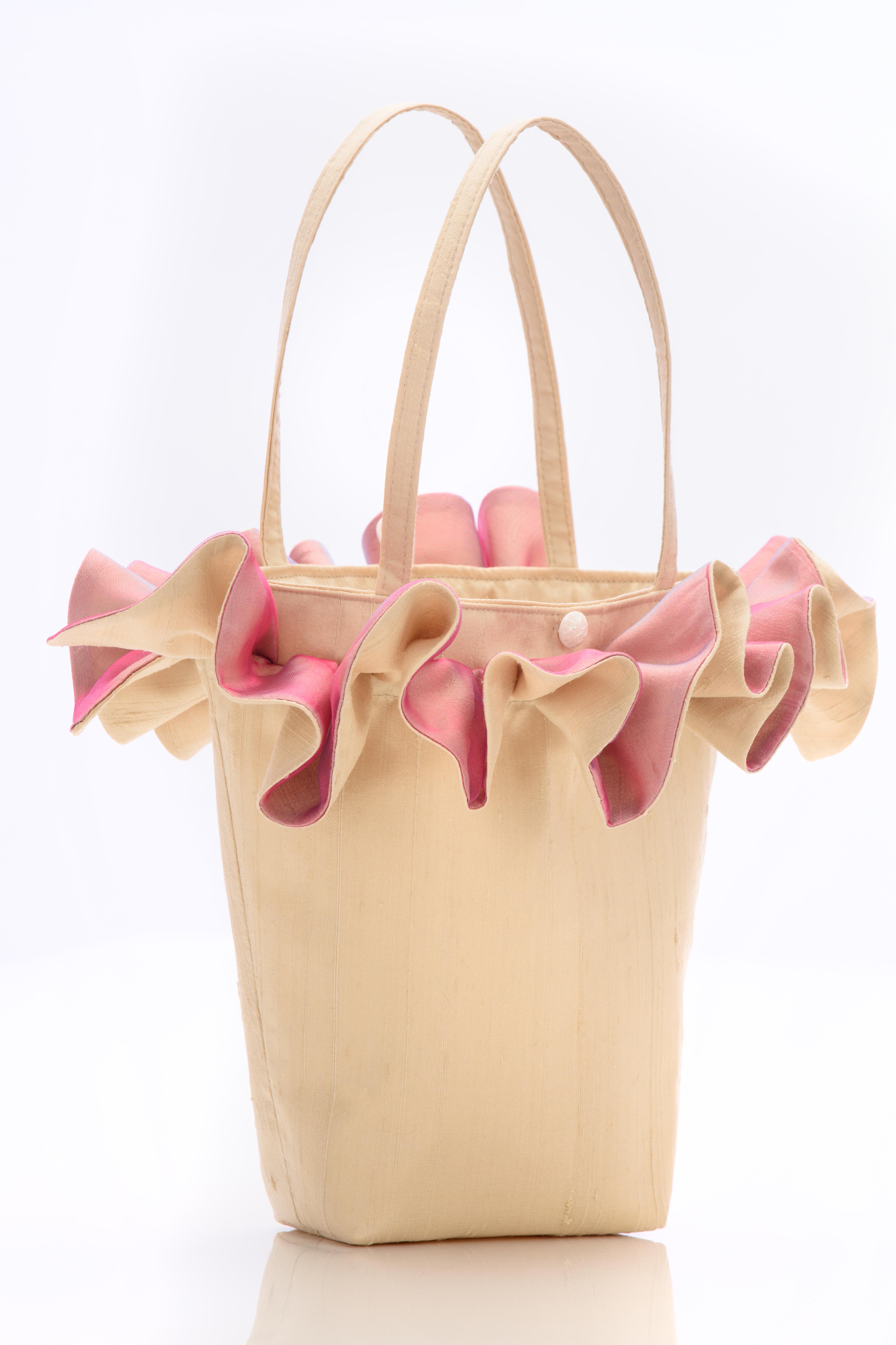 Cream silk handbag with pink organza ruffle