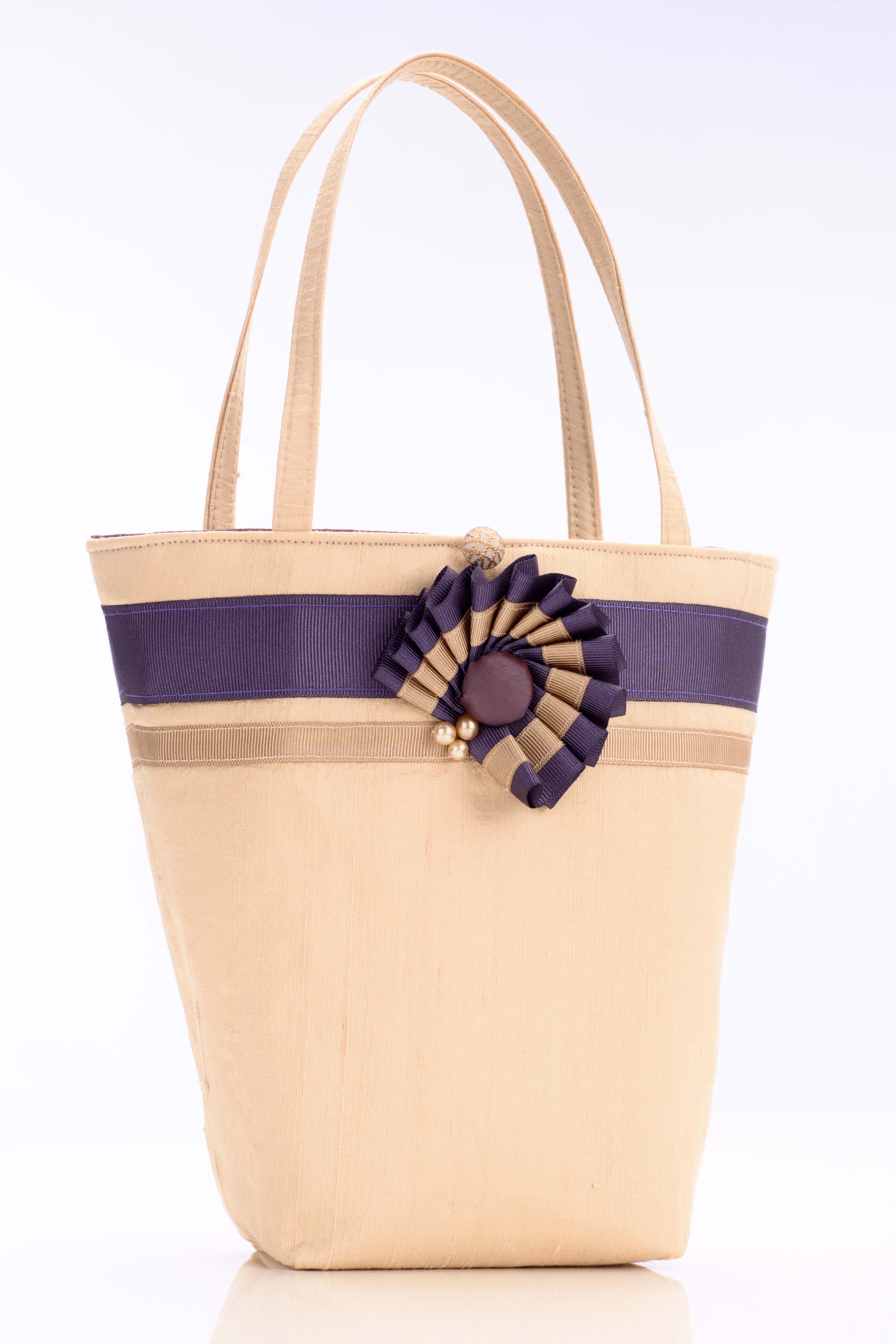 Cream silk handbag with purple ribbon trim